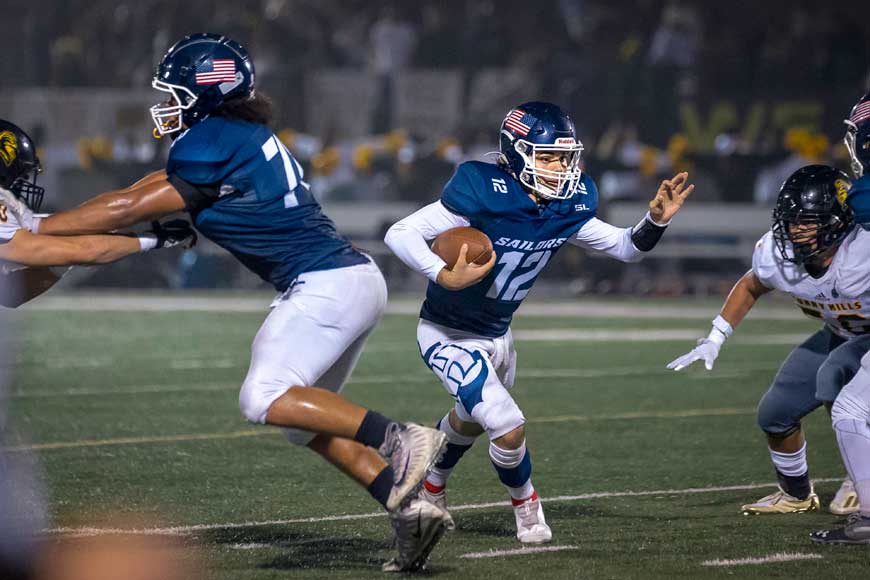 Guitron-Moore Throws for 3 TDs in Round 1 Playoff Victory